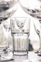 water glass on the shelves , Drinking water container, Empty water glass