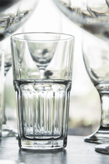 water glass on the shelves , Drinking water container, Empty water glass