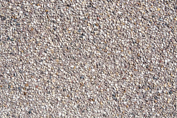 Small sand stone of sand wall texture or sand wall background. Natural sand stone for design with copy space for text or image.