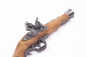 Old gun on white background