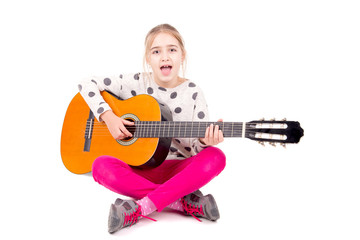 little girl with guitar