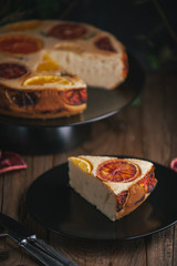 home made citrus cake on wooden table in rustic style