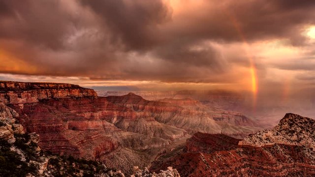 Storm clouds, Rainbow and warm sunlight at sunset all came together to create this dramatic scene at the Cape Royal viewpoint on the North Rim of Grand Canyon