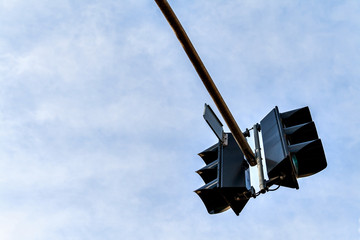 Traffic light against a clear blue sky