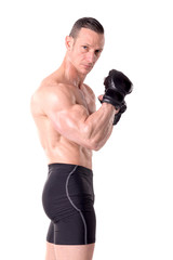 Fototapeta na wymiar fighter posing with gloves isolated in white