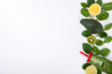 Smoothies Green. Drink Cocktail Spinach,Apple,Kiwi,Lemon,lime,avocado.Food or Healthy diet concept.Vegetarian.Copy space for Text. selective focus.