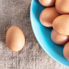  Eggs on wooden  background closeup