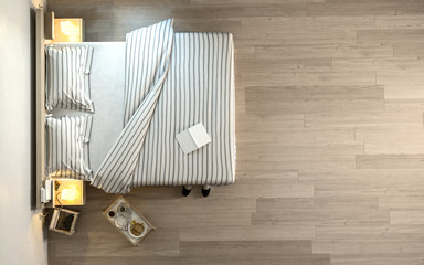 Bed with striped linens from above