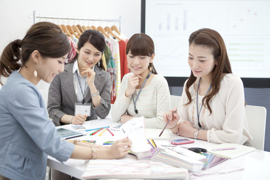 Four businesswomen in a meeting