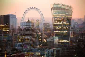Küchenrückwand glas motiv City of London at night. Multiple exposure image includes Walkie-Talkie building, City of London financial aria, London eye at sunset © IRStone