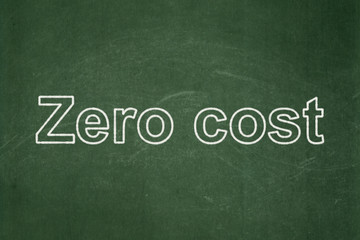 Finance concept: Zero cost on chalkboard background