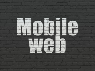 Web design concept: Mobile Web on wall background