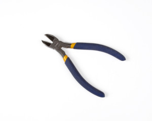 Blue side cutter pliers on a white background