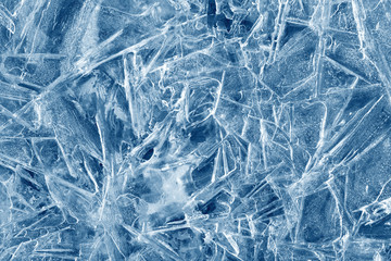 ice background texture. Melting ice with different shapes and cracks.