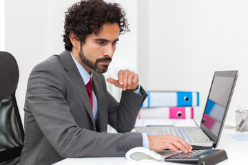 Businessman accounting in his office