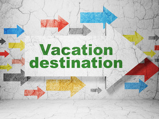 Vacation concept: arrow with Vacation Destination on grunge wall background