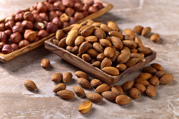 Almonds in old wooden dish