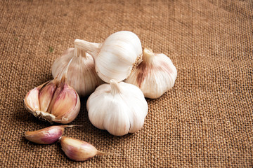 Garlic close-up on sacking. burlap background