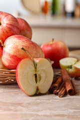 Naklejka na ściany i meble Juicy apples on a kitchen table