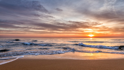 Dramatic sunrise on the beach