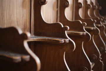 Wooden seats for the parishioners of the Christian church.