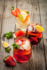 Traditional summer drink sangria - red, pink and white. With champagne, pink and red wine,...