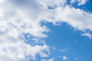 white clouds against blue sky