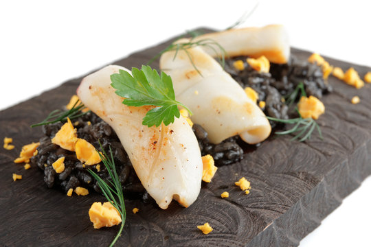Black squid ink rice and fried calamar