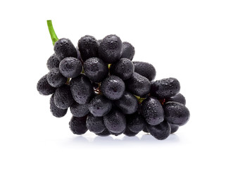 Black grapes with drop of water isolated on white background.