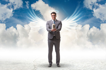 Angel investor concept with businessman with wings