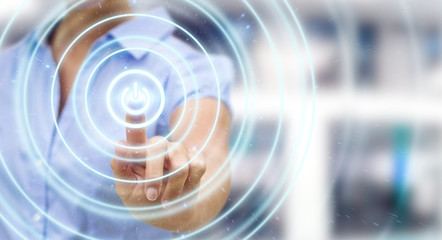 Businesswoman pushing 3D render power button with her finger