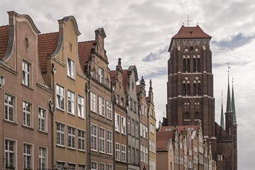Fototapeta premium St. Mary's Church in Gdansk and gables of houses 