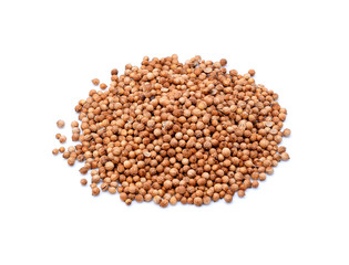 Pile of coriander seeds isolated on white background