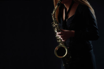 Saxophone Player Saxophonist playing jazz music - obrazy, fototapety, plakaty
