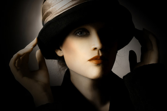 Retro woman in hat vintage portrait. Elegant lady in hat