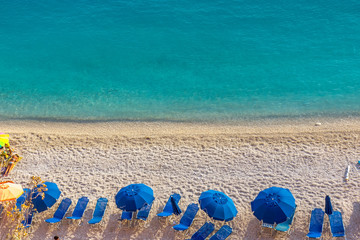 Blue umbrellas and blue sea - Greece, Lefkada island