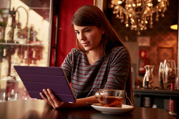 Beautiful young lady in a pub