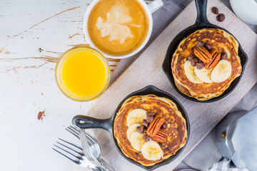 Breakfast - chocolate chip pancakes with coffee and juice