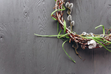 Easter concept wreath on a wooden background