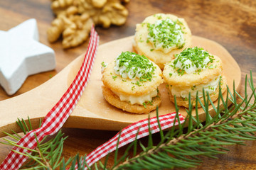 Christmas sweets on a wooden spoon