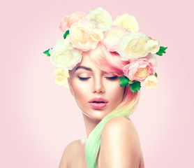 Beauty summer model girl with colorful flowers wreath. Flowers hair style