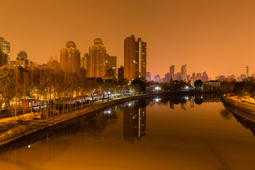 shanghai at night with foggy sky