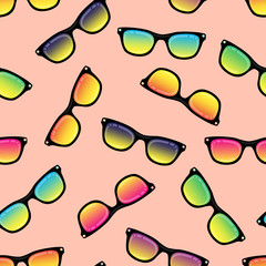 Seamless background from sunglasses with colored glasses. Pattern