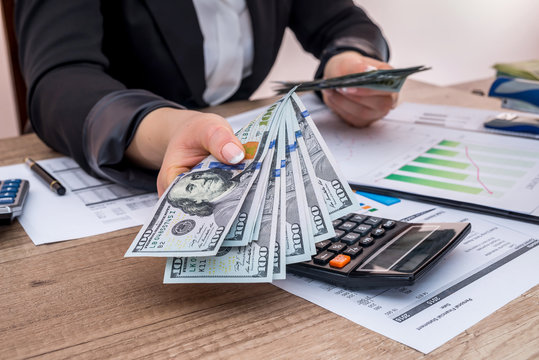 Business Woman Showing How Much Money Is Left After The Terms Of The Budget Year.