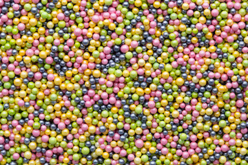 Multicoloured sweet sugar balls. Small ball pattern.