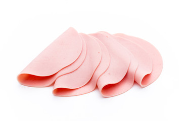 Sliced boiled ham sausage isolated on white background, top view