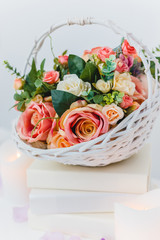 Fototapeta na wymiar Bouquet of flowers in a basket, Wedding decoration, hand made.