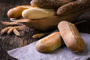 Freshly baked white and brown baguette