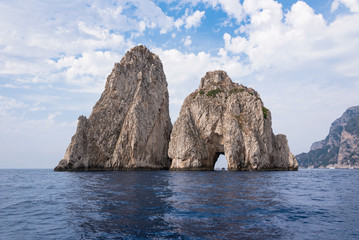 Fototapeta na wymiar Faraglioni rocks at Capri Island coast