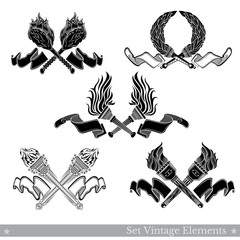 Set of crossed torches in engraving style isolated on white